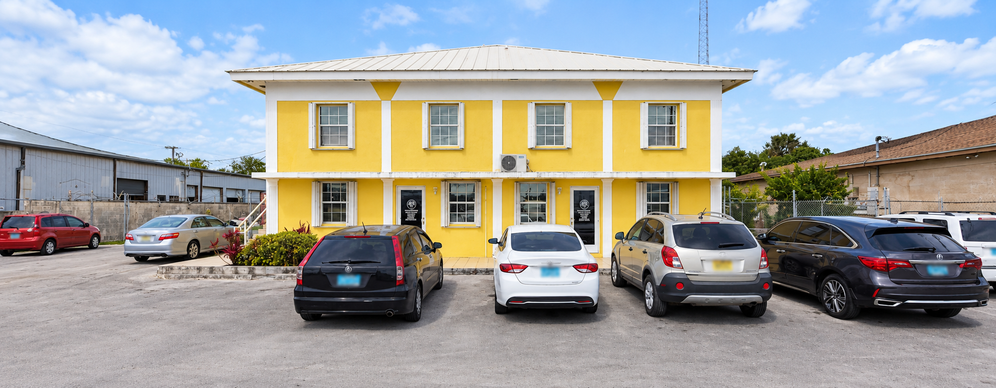 Exterior of Coral Pharmaceuticals’ yellow Freeport facility